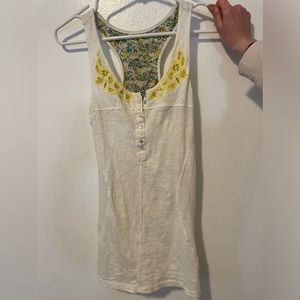 White tank top with yellow embroidered flowers